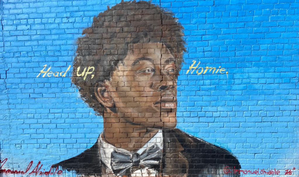 Detroit mural that says Head up, Homie. Could Detroit be the perfect place to live? How to decide where to live series. 